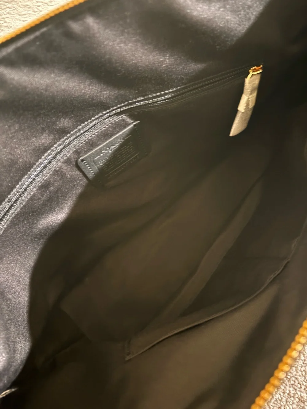 Coach Black Leather Tote with Gold Accents